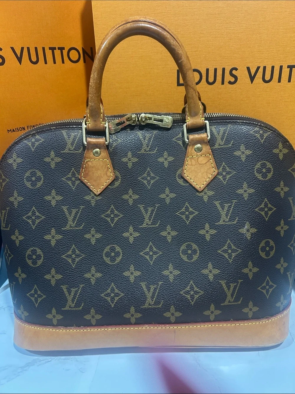 Louis Vuitton Monogram Alma Satchel in Brown and Tan